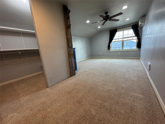 126 Moes Run, Kalispell, MT 59901 - additional living space featuring ceiling fan, a wall mounted air conditioner, lofted ceiling, carpet flooring, and recessed lighting