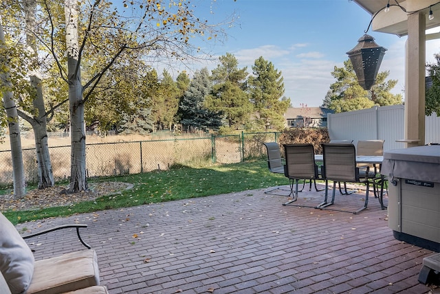 126 Moes Run, Kalispell, MT 59901 - wooden terrace with a lawn, fence, and outdoor dining space
