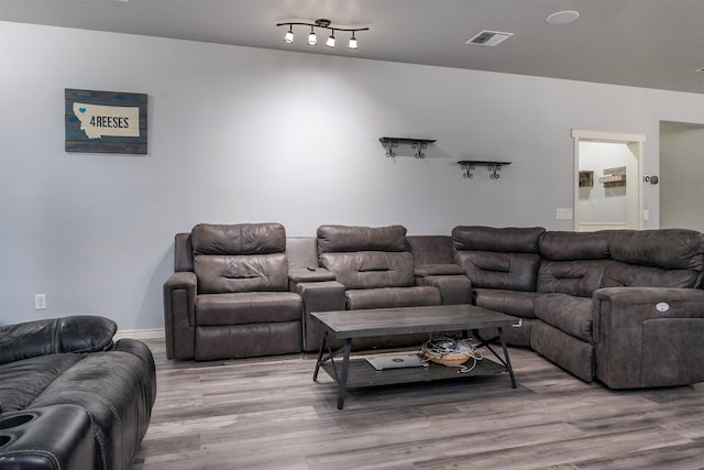 126 Moes Run, Kalispell, MT 59901 - living area featuring visible vents and wood finished floors