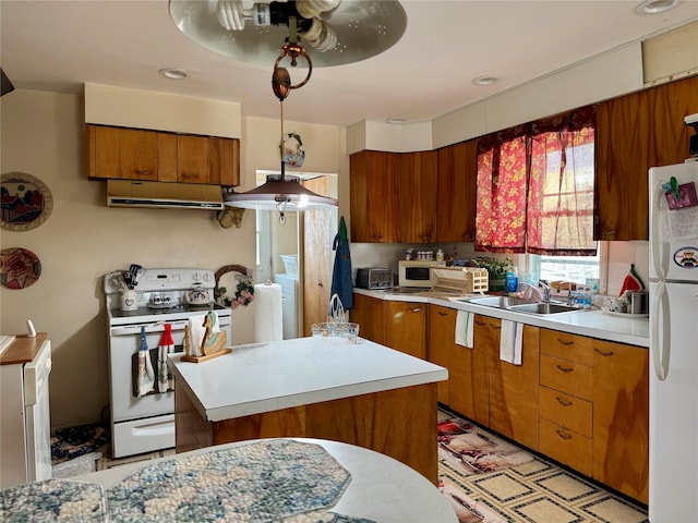 kitchen featuring white appliances, ventilation hood, ceiling fan, and sink