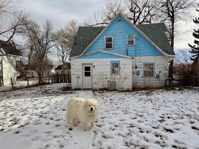 view of snow covered house