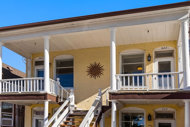 doorway to property featuring a porch