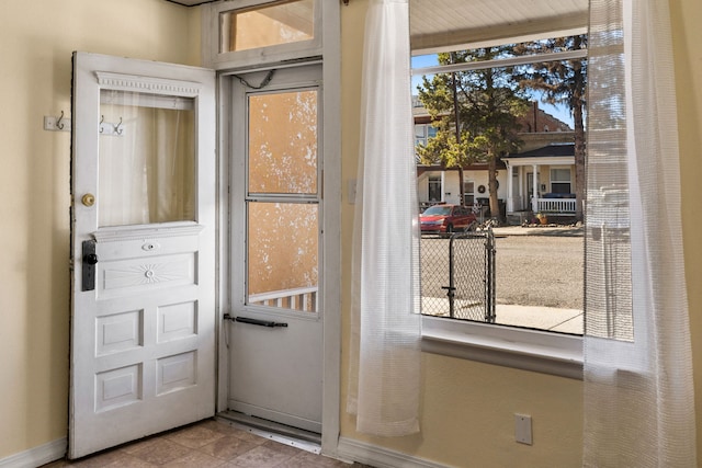 doorway to outside with a healthy amount of sunlight