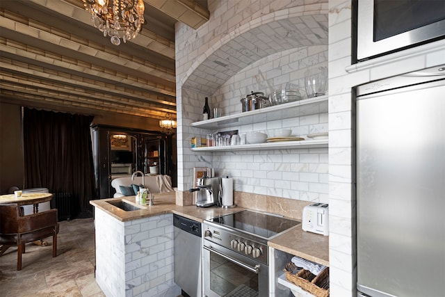 kitchen with appliances with stainless steel finishes and sink