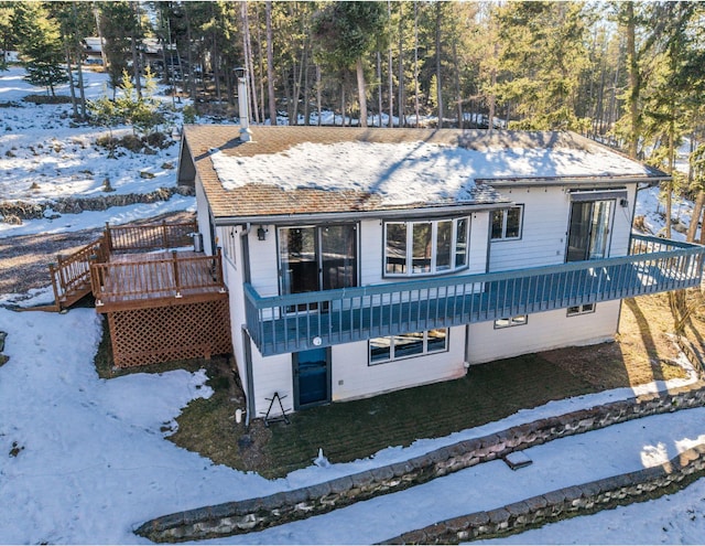 view of front of home with a wooden deck