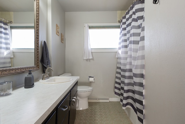 bathroom with vanity, a baseboard radiator, and toilet