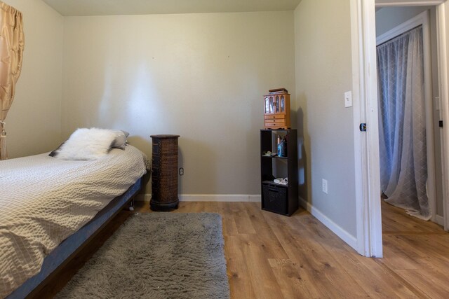 bedroom featuring light wood-type flooring