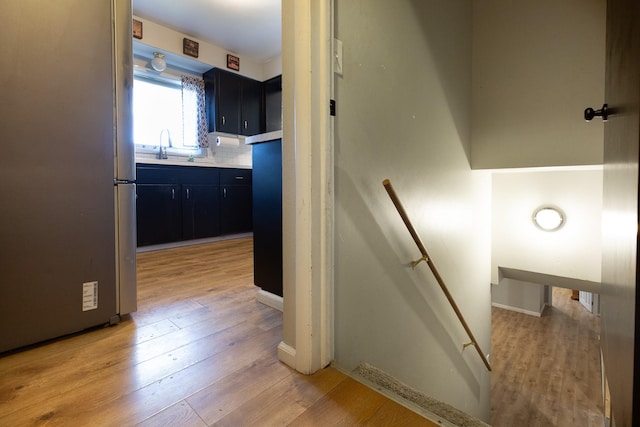 interior space with sink and hardwood / wood-style floors