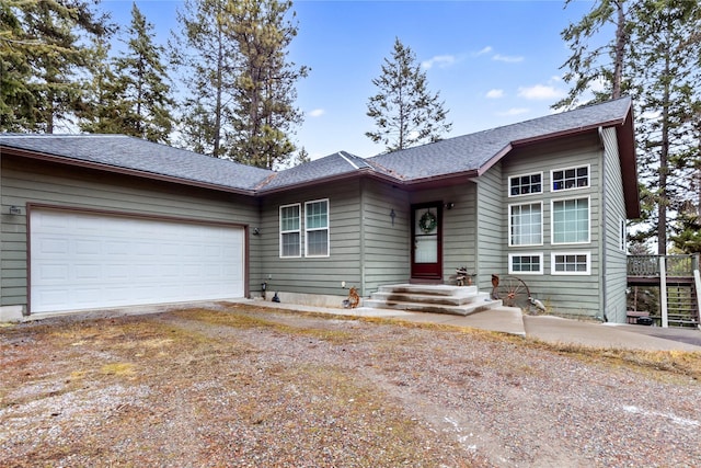 ranch-style home with a garage