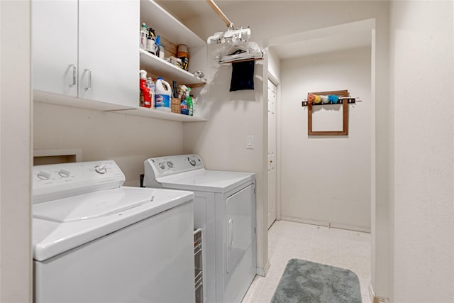 laundry room with cabinets and independent washer and dryer