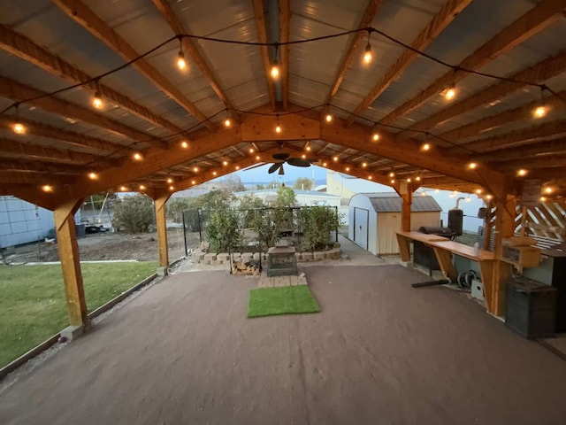 view of patio featuring a shed