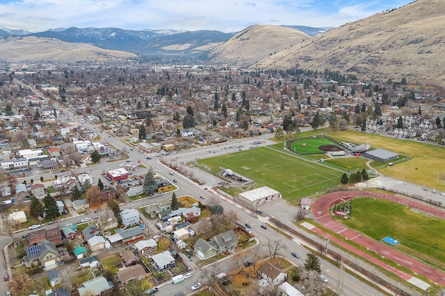 birds eye view of property with a mountain view