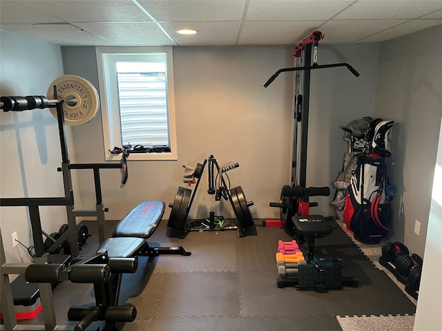 exercise room featuring a drop ceiling