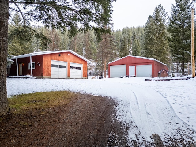 view of snow covered garage