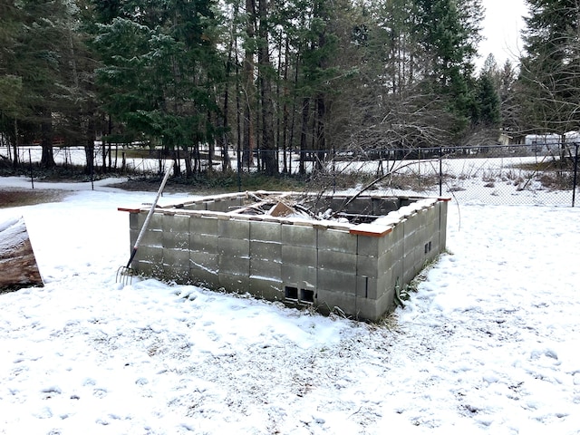 view of yard covered in snow