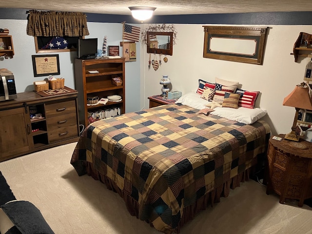 bedroom with light colored carpet