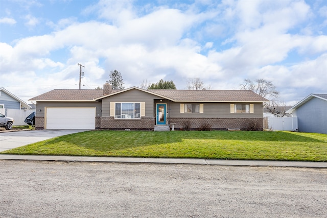 ranch-style home with a garage and a front lawn