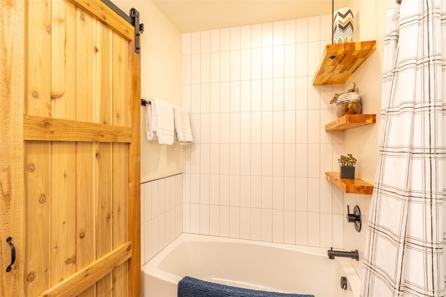 bathroom with shower / bathtub combination with curtain