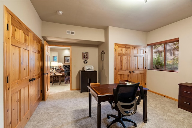 view of carpeted office space