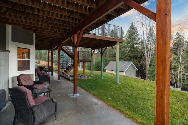 view of patio with outdoor lounge area and a wooden deck