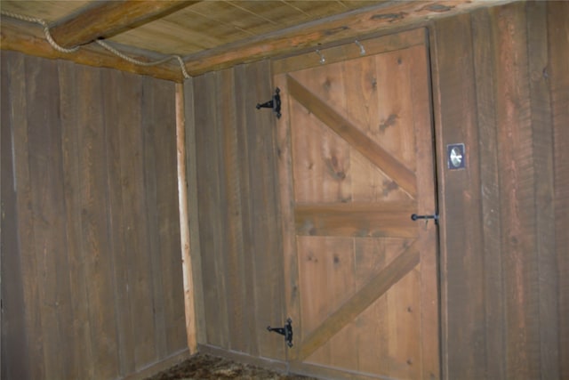 room details with wood walls and wood ceiling