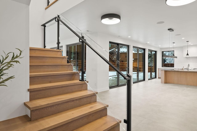 1027 State Park Rd, Whitefish, MT 59937 - staircase featuring recessed lighting and healthy amount of natural light