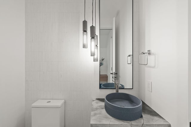 1027 State Park Rd, Whitefish, MT 59937 - bathroom featuring toilet and tile walls