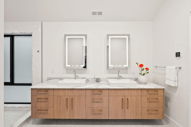 1027 State Park Rd, Whitefish, MT 59937 - bathroom featuring double vanity and baseboards