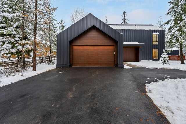 view of snow covered garage