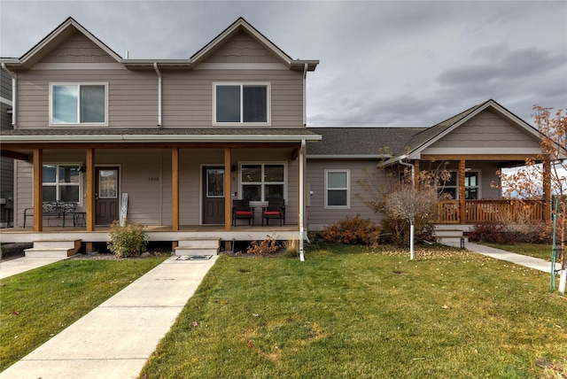 1825 Scott St Unit B, Missoula, MT 59802 - view of front of home with covered porch and a front lawn