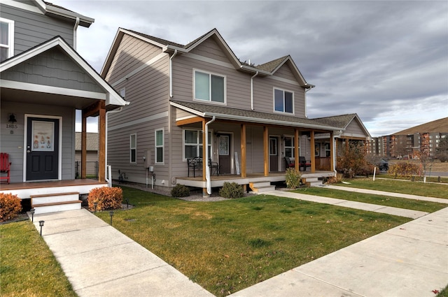 1825 Scott St Unit B, Missoula, MT 59802 - view of front of property featuring a porch and a front lawn
