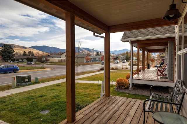 1825 Scott St Unit B, Missoula, MT 59802 - porch featuring a mountain view, a yard, and a residential view