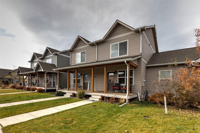 1825 Scott St Unit B, Missoula, MT 59802 - view of front of property featuring a porch and a front yard