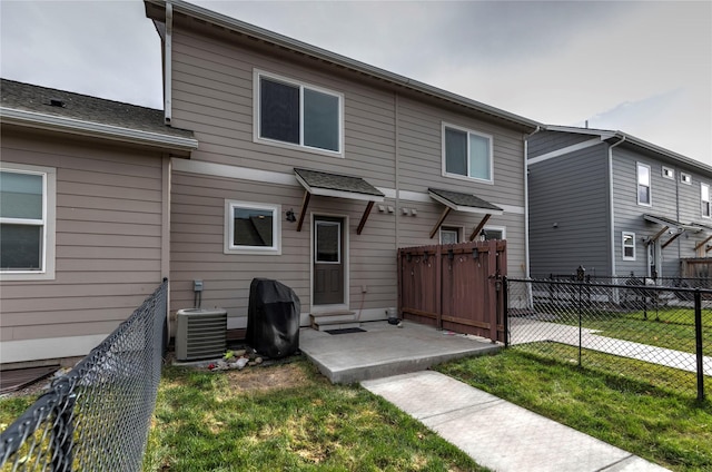 1825 Scott St Unit B, Missoula, MT 59802 - rear view of property with cooling unit and entry steps