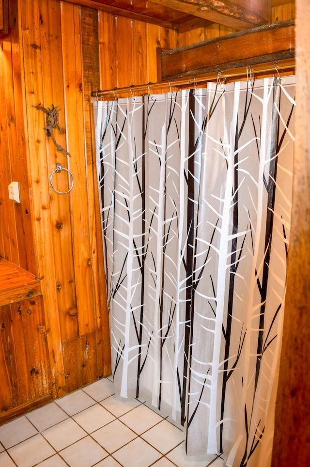 32927 Hellroaring Rd, Polson, MT 59860 - bathroom with wood walls, tile patterned floors, and vanity