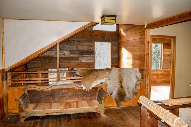 32927 Hellroaring Rd, Polson, MT 59860 - unfurnished room with wood finished floors, plenty of natural light, baseboards, and wood walls