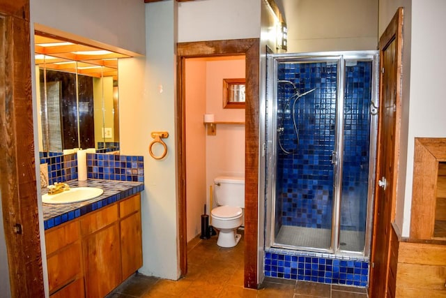 32927 Hellroaring Rd, Polson, MT 59860 - bathroom featuring vanity and tasteful backsplash
