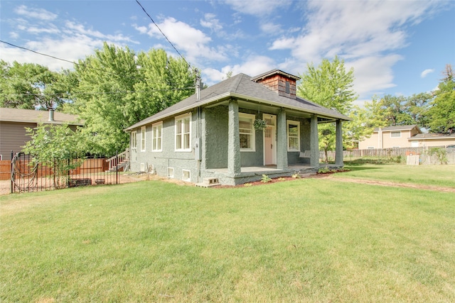 view of front of home with a front lawn