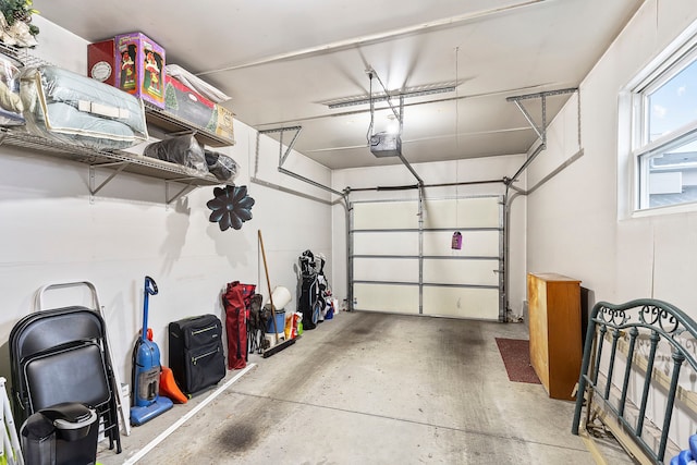 garage featuring a garage door opener