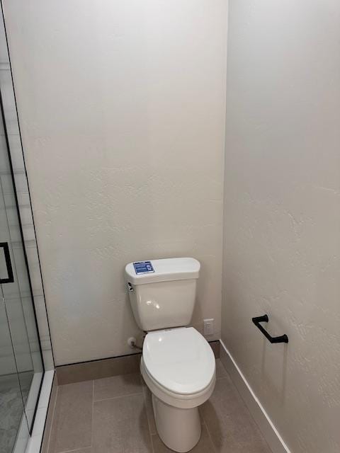 7026 Max Dr, Missoula, MT 59803 - full bathroom with a shower stall and tile patterned floors