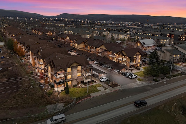 aerial view at dusk with a mountain view