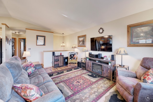 living room with wood-type flooring and vaulted ceiling