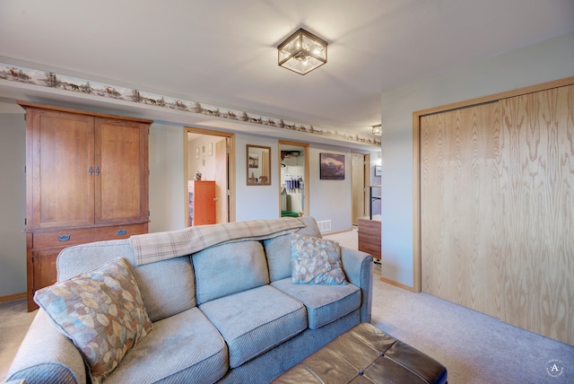 living room featuring light carpet