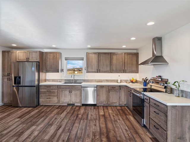 4 Sapphire Way, Sheridan, MT 59749 - kitchen featuring stainless steel appliances, wall chimney exhaust hood, a sink, dark wood-style flooring, and recessed lighting