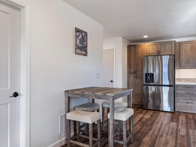 4 Sapphire Way, Sheridan, MT 59749 - kitchen with stainless steel refrigerator with ice dispenser, dark wood finished floors, recessed lighting, and baseboards