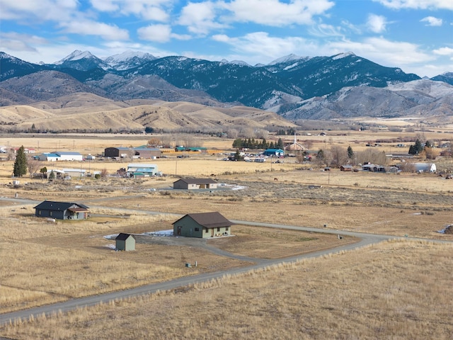 mountain view featuring a rural view