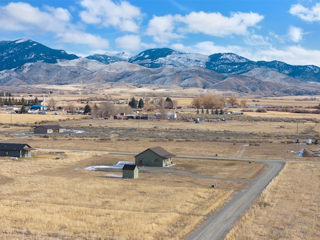 view of mountain feature with a rural view