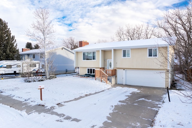 bi-level home with a garage