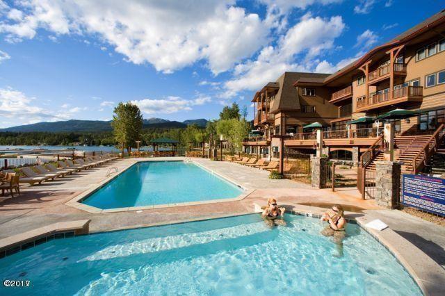 view of swimming pool with a mountain view