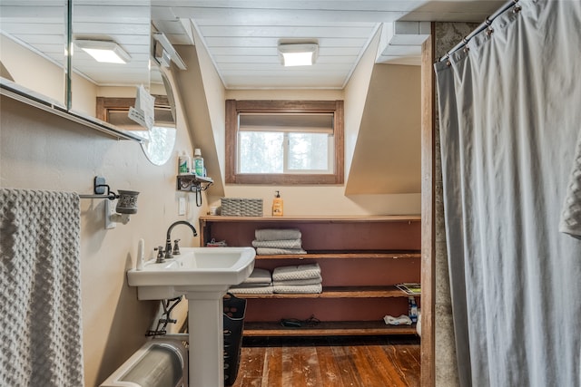 bathroom featuring hardwood / wood-style floors and sink